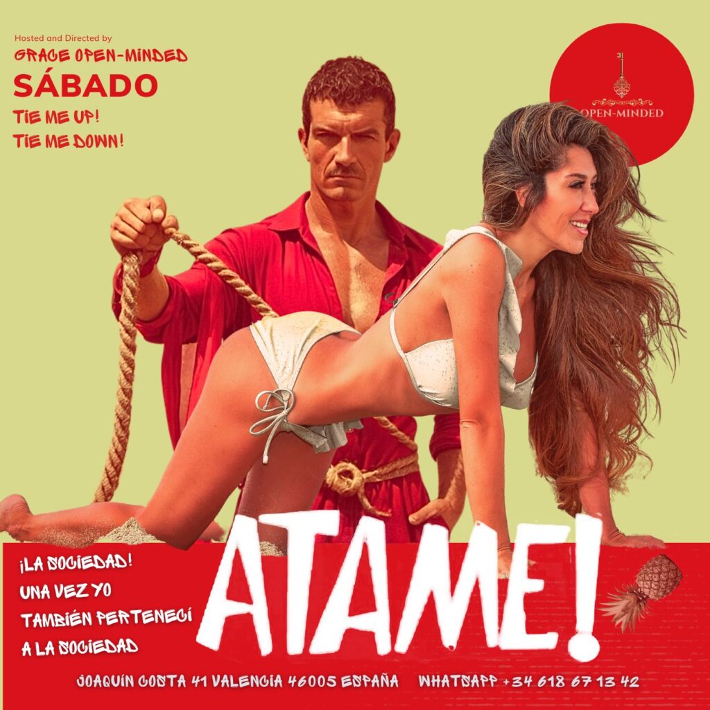 Imagen promocional de la fiesta “Tie Me Up! Tie Me Down! ÁTAME!” en el Club Open-Minded de Valencia. Un hombre con camisa roja sujeta una cuerda, mientras una mujer en lencería blanca posa en una postura sugerente. El fondo es de color amarillo, con un cartel que detalla el evento, incluyendo la ubicación, el nombre de la fiesta, y el número de contacto.